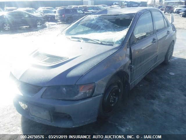 JA3AH86C86U061304 - 2006 MITSUBISHI LANCER EVOLUTION GRAY photo 2