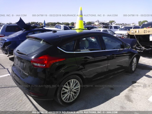 1FADP3N26GL214420 - 2016 FORD FOCUS TITANIUM BLACK photo 4