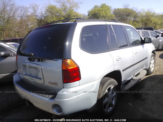 1GKDS13S572222776 - 2007 GMC ENVOY SILVER photo 4