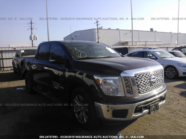 1N6AA1E69JN530425 - 2018 NISSAN TITAN SV/SL/PLATINUM RESERVE BLACK photo 1