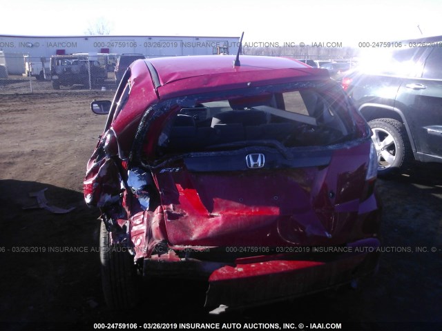 JHMGE8H26AS000643 - 2010 HONDA FIT RED photo 6