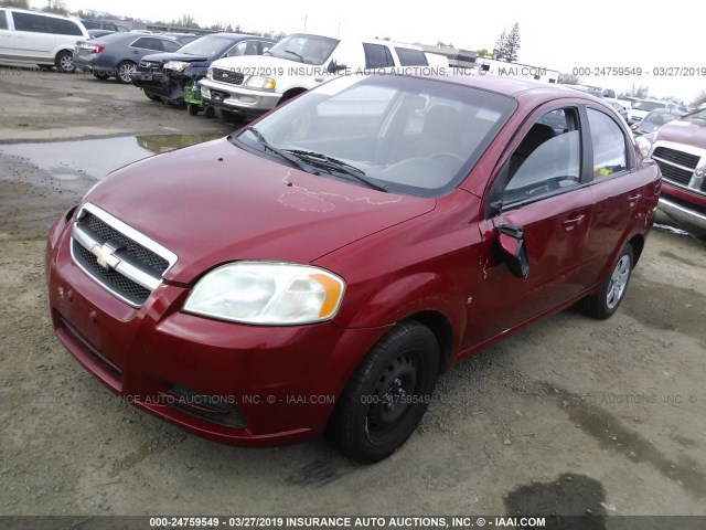 KL1TD56E59B664322 - 2009 CHEVROLET AVEO LS/LT წითელი ფოტო 2