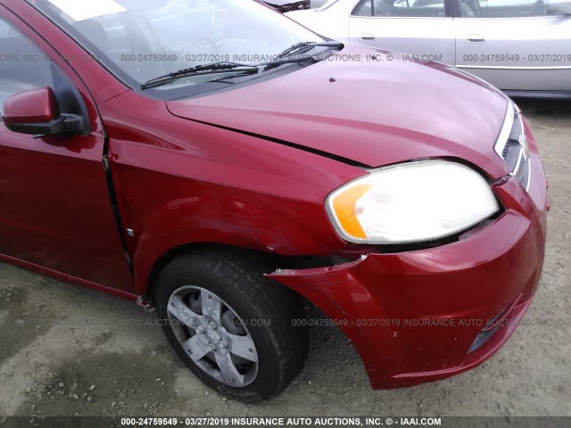 KL1TD56E59B664322 - 2009 CHEVROLET AVEO LS/LT წითელი ფოტო 6