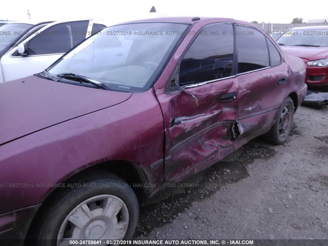 1Y1SK5369RZ030005 - 1994 GEO PRIZM LSI RED photo 6