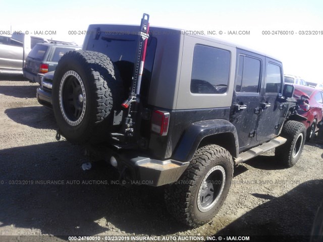 1J4BA5H16AL105586 - 2010 JEEP WRANGLER UNLIMITE SAHARA BLACK photo 4