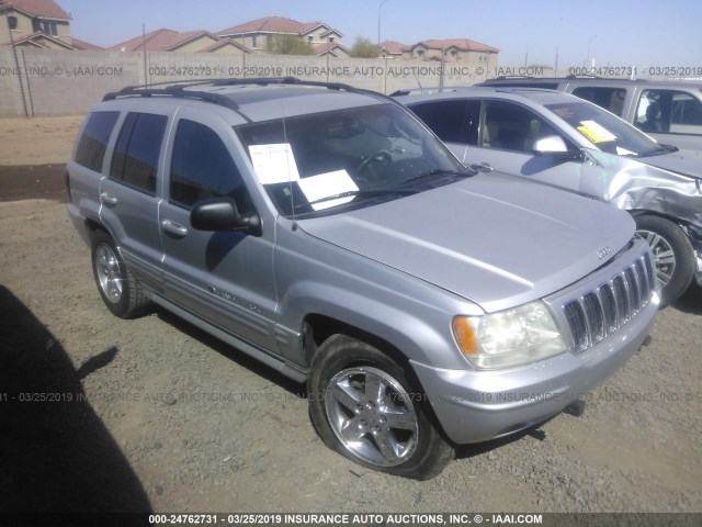 1J8GW68J43C556319 - 2003 JEEP GRAND CHEROKEE OVERLAND SILVER photo 1