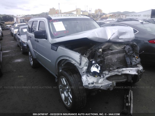 1D4PT4GKXBW574323 - 2011 DODGE NITRO HEAT SILVER photo 1