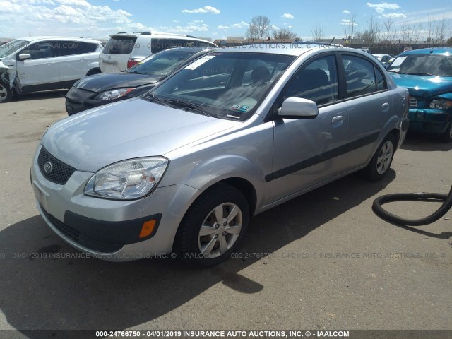 KNADE223X96518890 - 2009 KIA RIO LX/SX GRAY photo 2