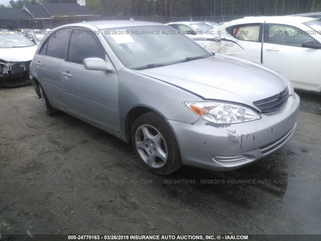 4T1BE32K93U695596 - 2003 TOYOTA CAMRY LE/XLE/SE SILVER photo 1