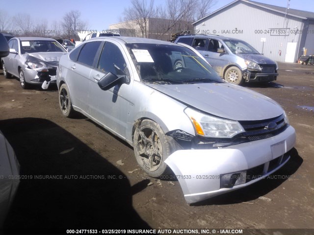 1FAHP36N19W113667 - 2009 FORD FOCUS SES SILVER photo 1