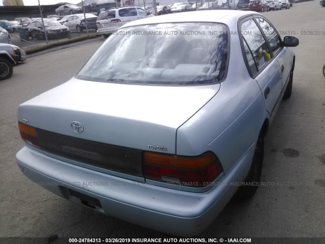 1NXAE09B9RZ182177 - 1994 TOYOTA COROLLA LE/DX BLUE photo 4