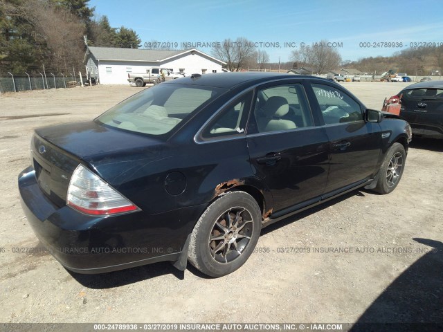 1FAHP24W28G130606 - 2008 FORD TAURUS SEL BLACK photo 4