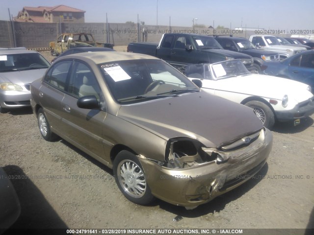 KNADC125846317838 - 2004 KIA RIO GOLD photo 1