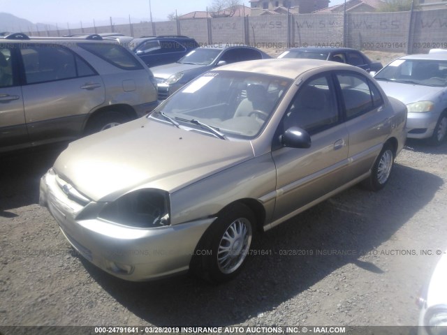 KNADC125846317838 - 2004 KIA RIO GOLD photo 2