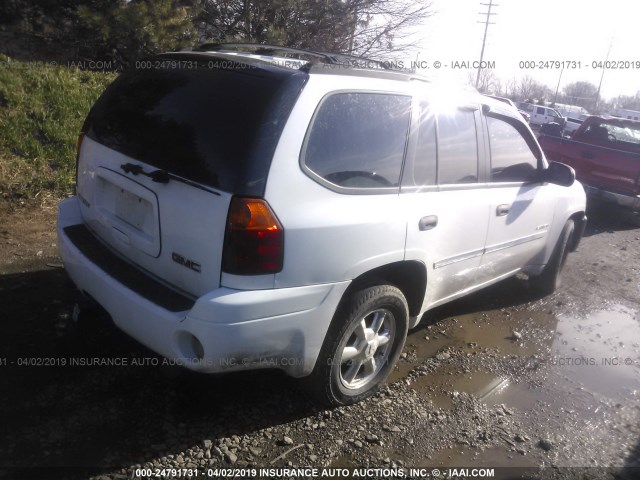 1GKDT13S362265914 - 2006 GMC ENVOY WHITE photo 4