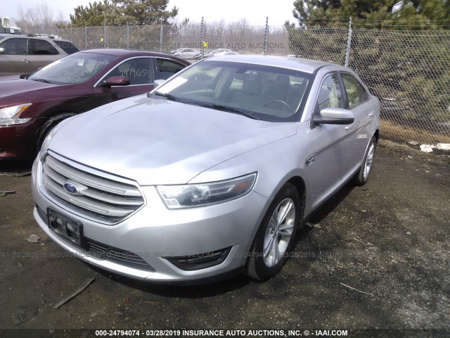 1FAHP2E82FG104357 - 2015 FORD TAURUS SEL SILVER photo 2