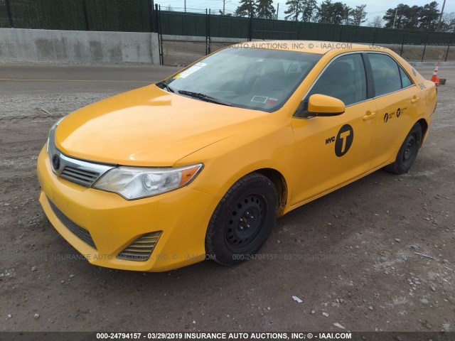 4T1BD1FK2EU108823 - 2014 TOYOTA CAMRY HYBRID/LE/XLE YELLOW photo 6