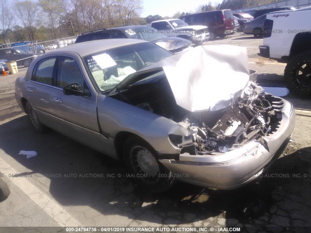 1LNHM81W4XY699892 - 1999 LINCOLN TOWN CAR EXECUTIVE GOLD photo 1