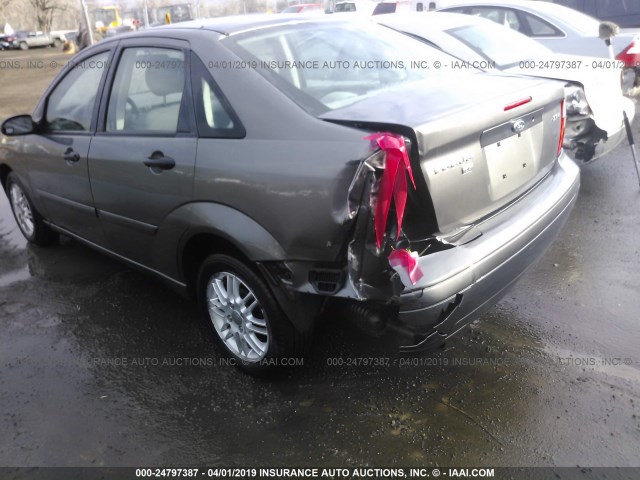 1FAFP34N55W131903 - 2005 FORD FOCUS ZX4 GRAY photo 6