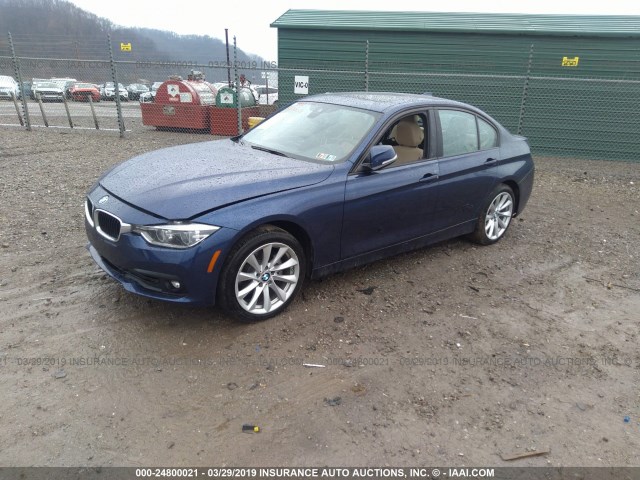 WBA8E5G55JNU47881 - 2018 BMW 320 XI Dark Blue photo 2