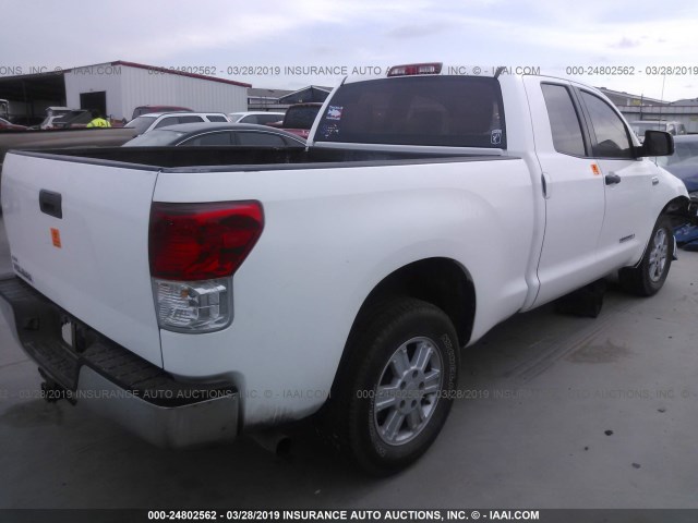 5TFRM5F11AX009890 - 2010 TOYOTA TUNDRA DOUBLE CAB SR5 WHITE photo 4