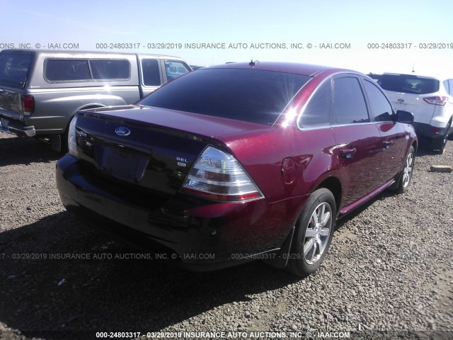 1FAHP27W28G145733 - 2008 FORD TAURUS SEL RED photo 4