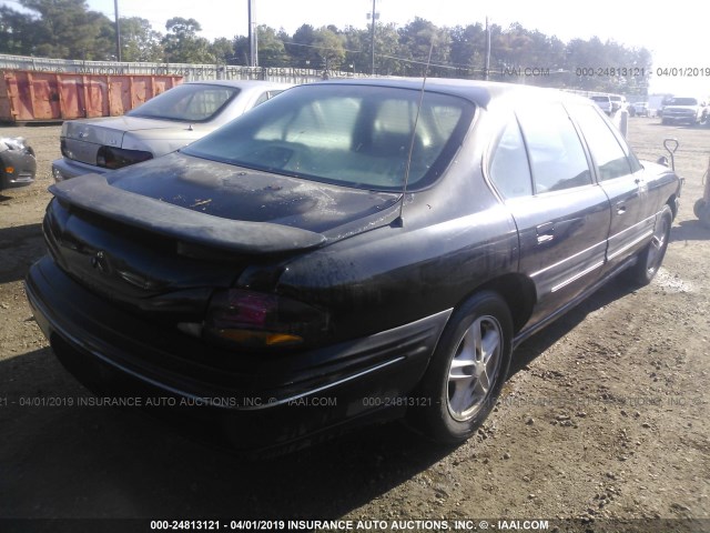 1G2HX52KXVH202660 - 1997 PONTIAC BONNEVILLE SE BLACK photo 4