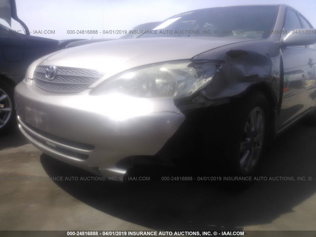 JTDBF30K320011684 - 2002 TOYOTA CAMRY LE/XLE/SE GOLD photo 6