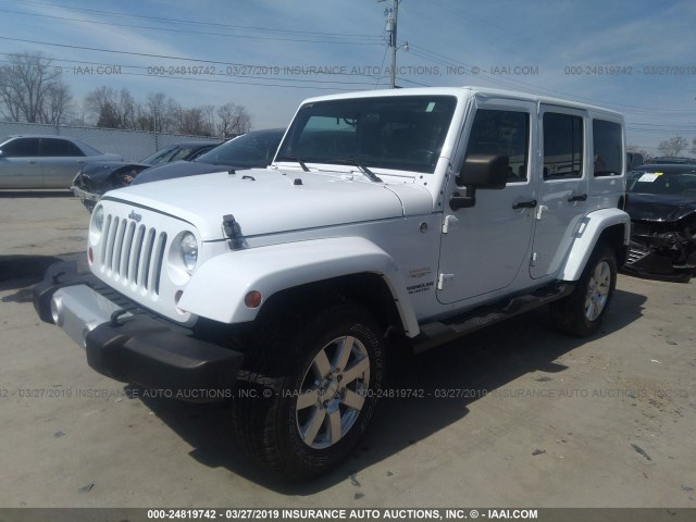 1C4BJWEG0CL240960 - 2012 JEEP WRANGLER UNLIMITE SAHARA WHITE photo 2