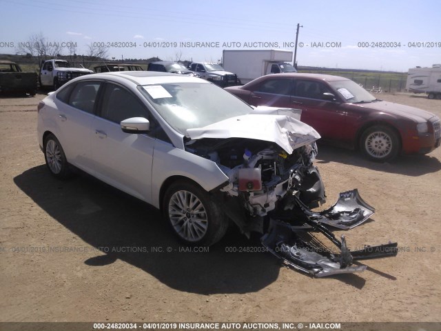 1FADP3J24HL328536 - 2017 FORD FOCUS TITANIUM WHITE photo 1