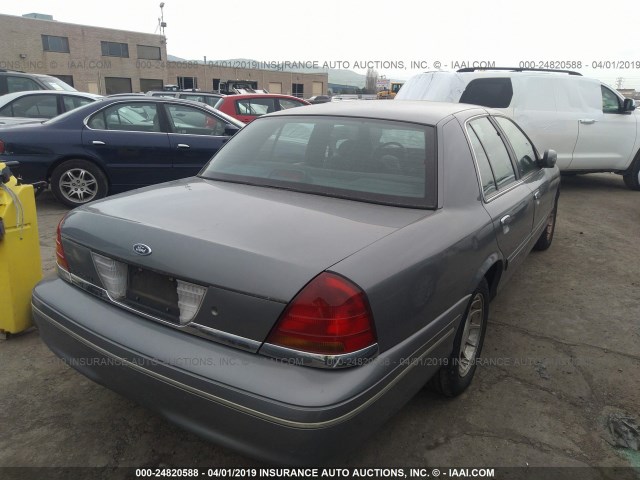 2FAFP74W7XX238149 - 1999 FORD CROWN VICTORIA LX GRAY photo 4