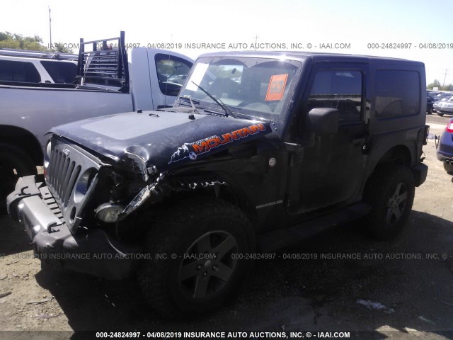 1J4AA2D11AL189428 - 2010 JEEP WRANGLER SPORT BLACK photo 2