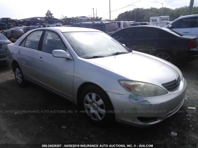 4T1BE32K73U765399 - 2003 TOYOTA CAMRY LE/XLE/SE SILVER photo 1