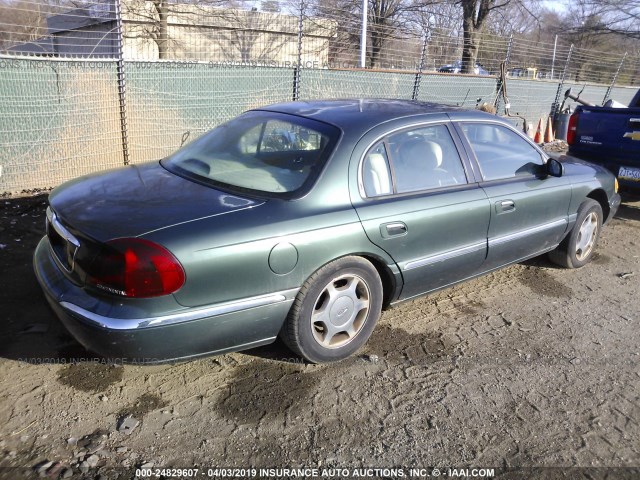 1LNHM97V61Y662886 - 2001 LINCOLN CONTINENTAL  GREEN photo 4