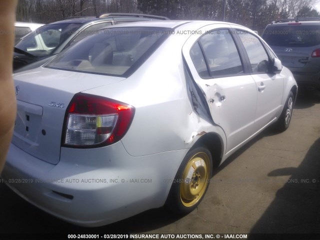 JS2YC5A28B6304111 - 2011 SUZUKI SX4 LE WHITE photo 4