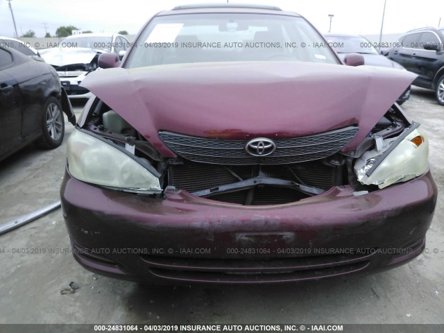 4T1BE30K32U075814 - 2002 TOYOTA CAMRY LE/XLE/SE RED photo 6