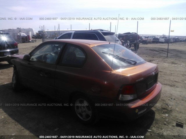 KMHCG35G3YU055817 - 2000 HYUNDAI ACCENT GS ORANGE photo 3