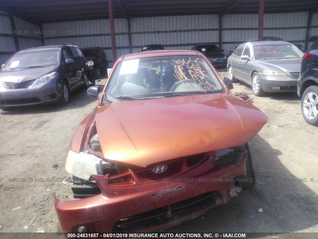 KMHCG35G3YU055817 - 2000 HYUNDAI ACCENT GS ORANGE photo 6