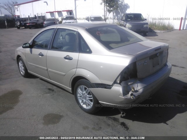 1FAFP34NX6W114578 - 2006 FORD FOCUS ZX4 GOLD photo 3