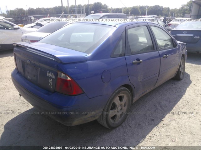 1FAHP34NX6W171257 - 2006 FORD FOCUS ZX4 BLUE photo 4