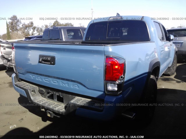 5TFCZ5AN0JX122683 - 2018 TOYOTA TACOMA DBL CAB/SR/TRDSPT/OR/PRO BLUE photo 4