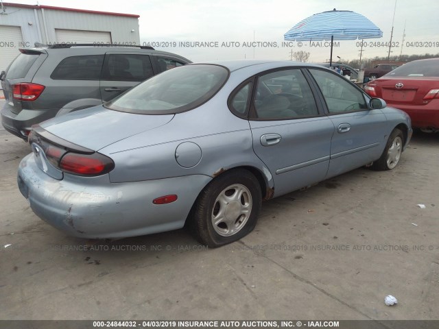 1FAFP52S9WG217957 - 1998 FORD TAURUS LX/SE BLUE photo 4