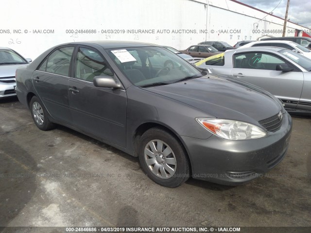 4T1BE32K23U667395 - 2003 TOYOTA CAMRY LE/XLE/SE GRAY photo 1