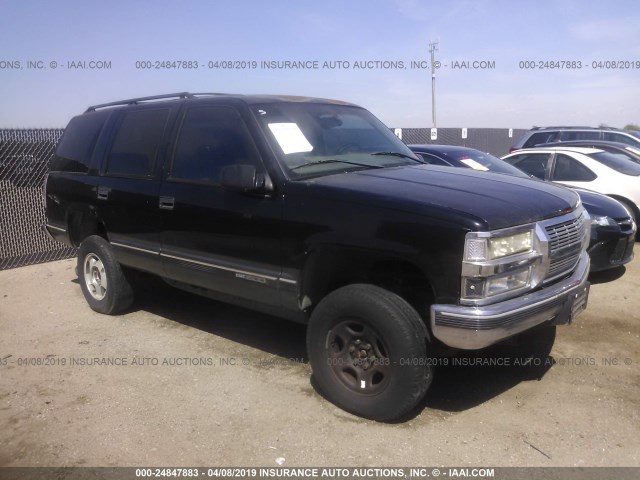 1GKEK13RXXJ729812 - 1999 GMC YUKON BLACK photo 1