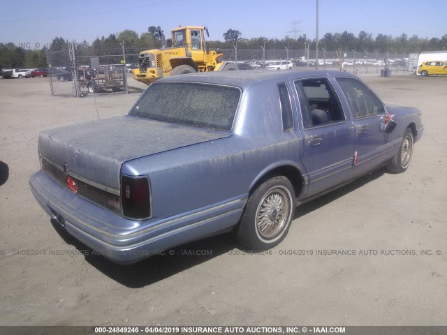 1LNLM81W8RY774431 - 1994 LINCOLN TOWN CAR EXECUTIVE BLUE photo 4