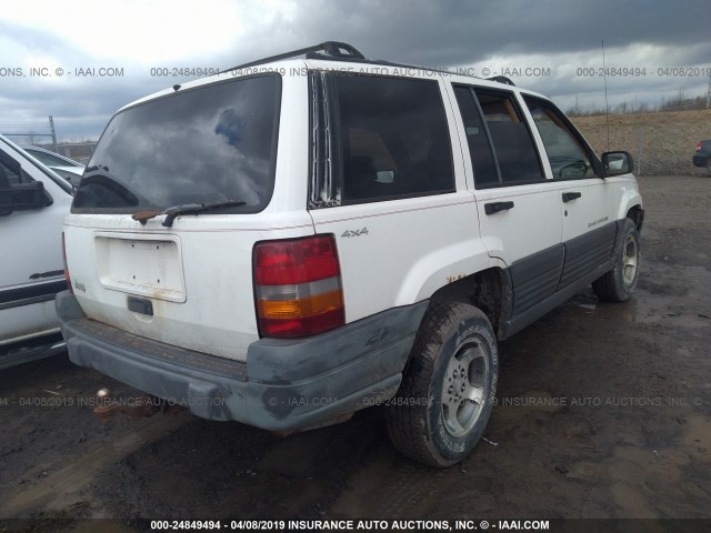 1J4GZ58S3VC564443 - 1997 JEEP GRAND CHEROKEE LAREDO/TSI WHITE photo 4