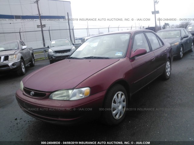 2T1BR18E3YC288859 - 2000 TOYOTA COROLLA VE/CE/LE RED photo 2