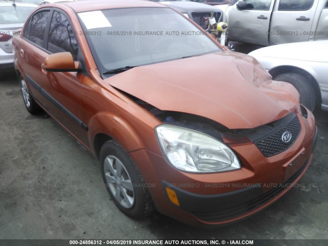 KNADE223996440375 - 2009 KIA RIO LX/SX ORANGE photo 1