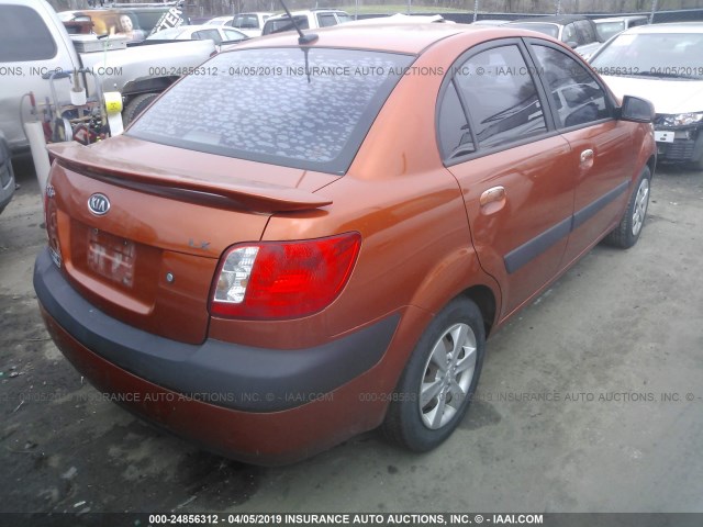 KNADE223996440375 - 2009 KIA RIO LX/SX ORANGE photo 4