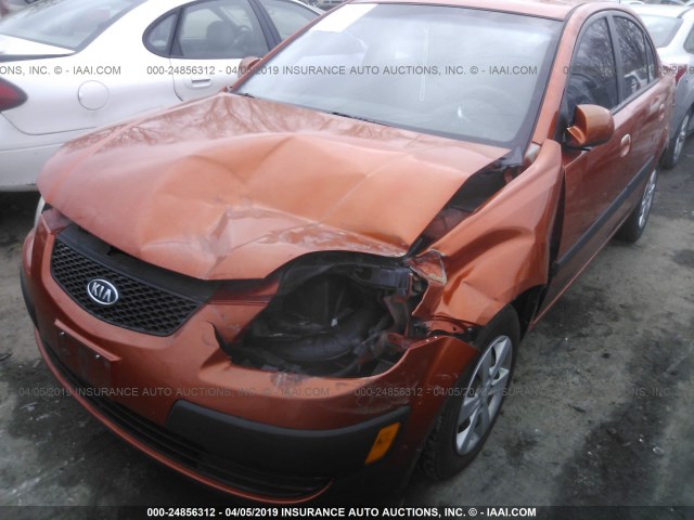 KNADE223996440375 - 2009 KIA RIO LX/SX ORANGE photo 6